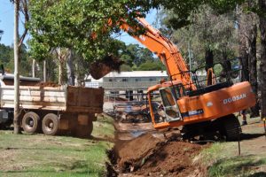 Excavator Tackles Flood Damage
