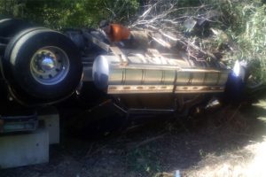 Driver Escapes As Rig Overturns