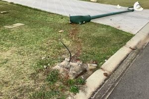 Driver Charged After Pole Axed