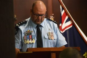 Community Pauses In Respect